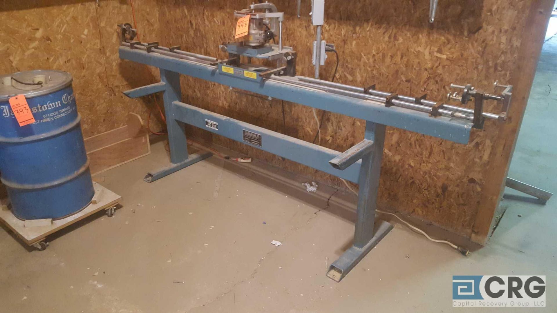 Norfield 250M router table, 8 ft. long, with Dayton 3Z579 industrial shop vacuum, drum type, s/n