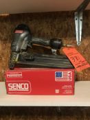 Senco SNS41 pneumatic nailer, with box of nails.