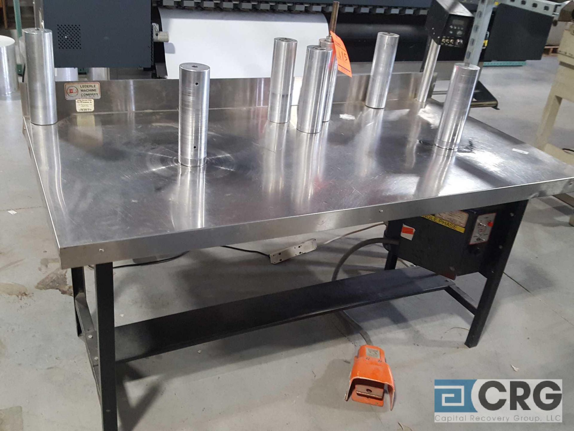 5' stainless steel finishing rewind table with foot pedal control.