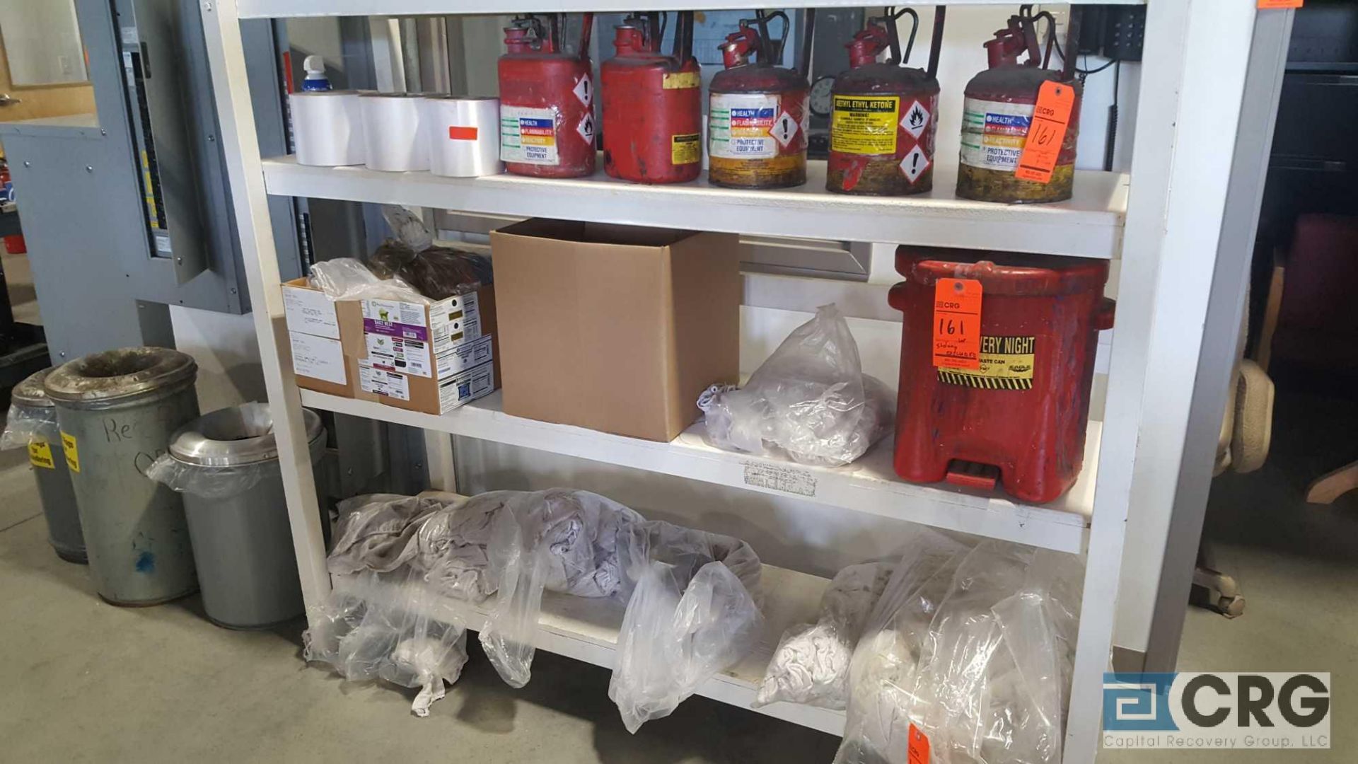 One lot of assorted rags, flammable liquid storage containers, and oily rag container, contents of