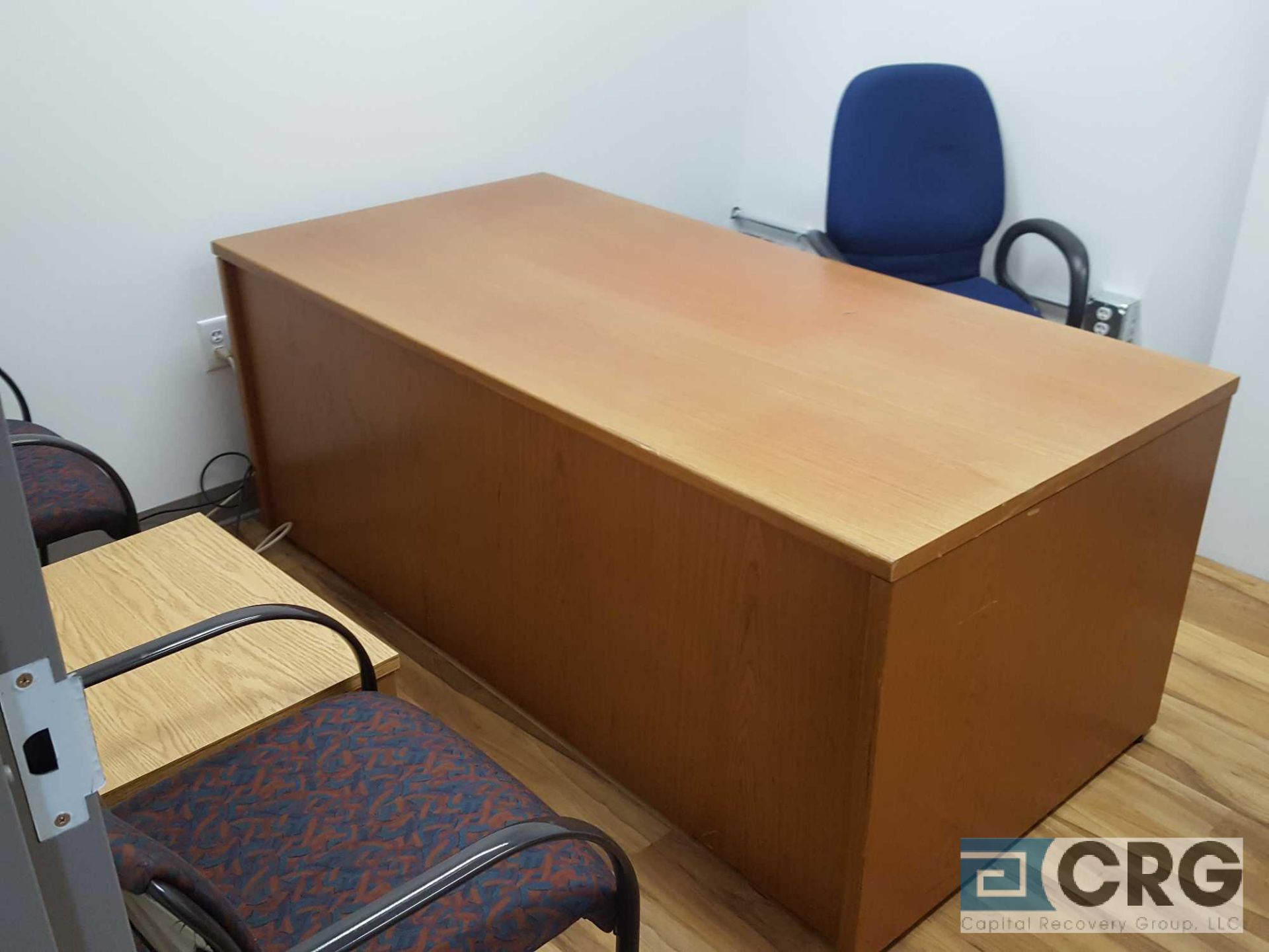 Lot of assorted office furnishings, in desks, credenzas, chairs, bookcases, etc. Excludes any with