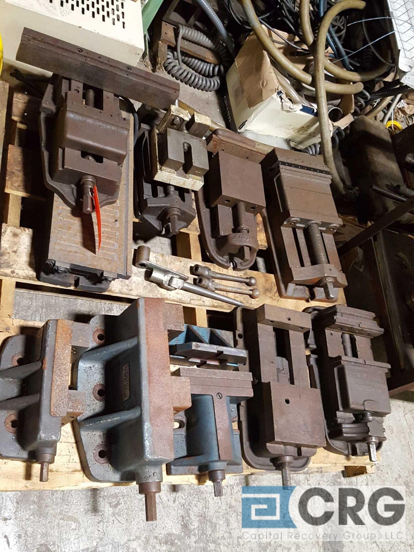 Lot of assorted machinists vises and (1) magnetic chuck.