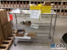 Lot of (4) portable Metro type shelving units