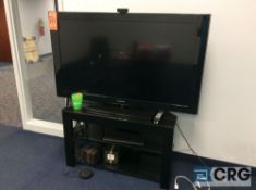 Samsung 52 inch flatscreen TV with Logitech camera and table