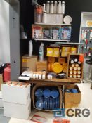 Lot of assorted paper goods, plastic wares, packing tape etc, contents of table and under table,
