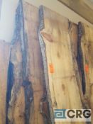 Lot of (9) assorted rough cut wood planks approximately 8 and one half foot long x 30 inches wide, 2