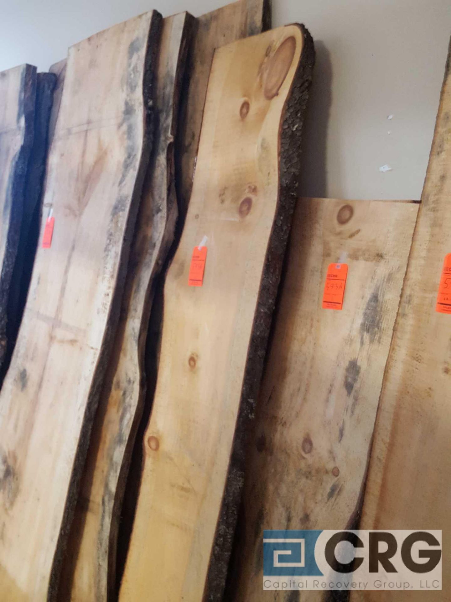 Lot of (7) assorted rough cut wood planks, approximately 8 and one half foot long x 30 inch wide,