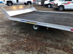 2008 Karavan snow trailer, tilting 10 ft. x 10 ft. aluminum frame, 2 in. ball to tow, GVWR 1880 lbs