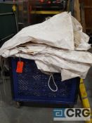 Lot of assorted tent bags with transport cart.