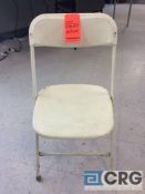 Lot of (50) off-white stackable folding chairs