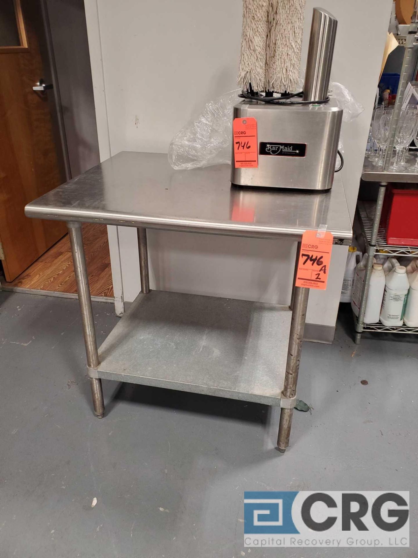 Lot of (2) stainless steel work tables (NO CONTENTS)