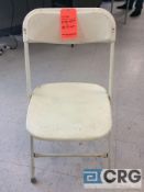 Lot of (50) off-white stackable folding chairs