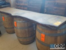 9 foot long wood bar top with two wine cask stands