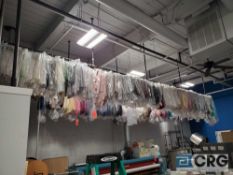 Lot of approx (3800) asst sashes, overlays, and runners (hanging from ceiling style rack)