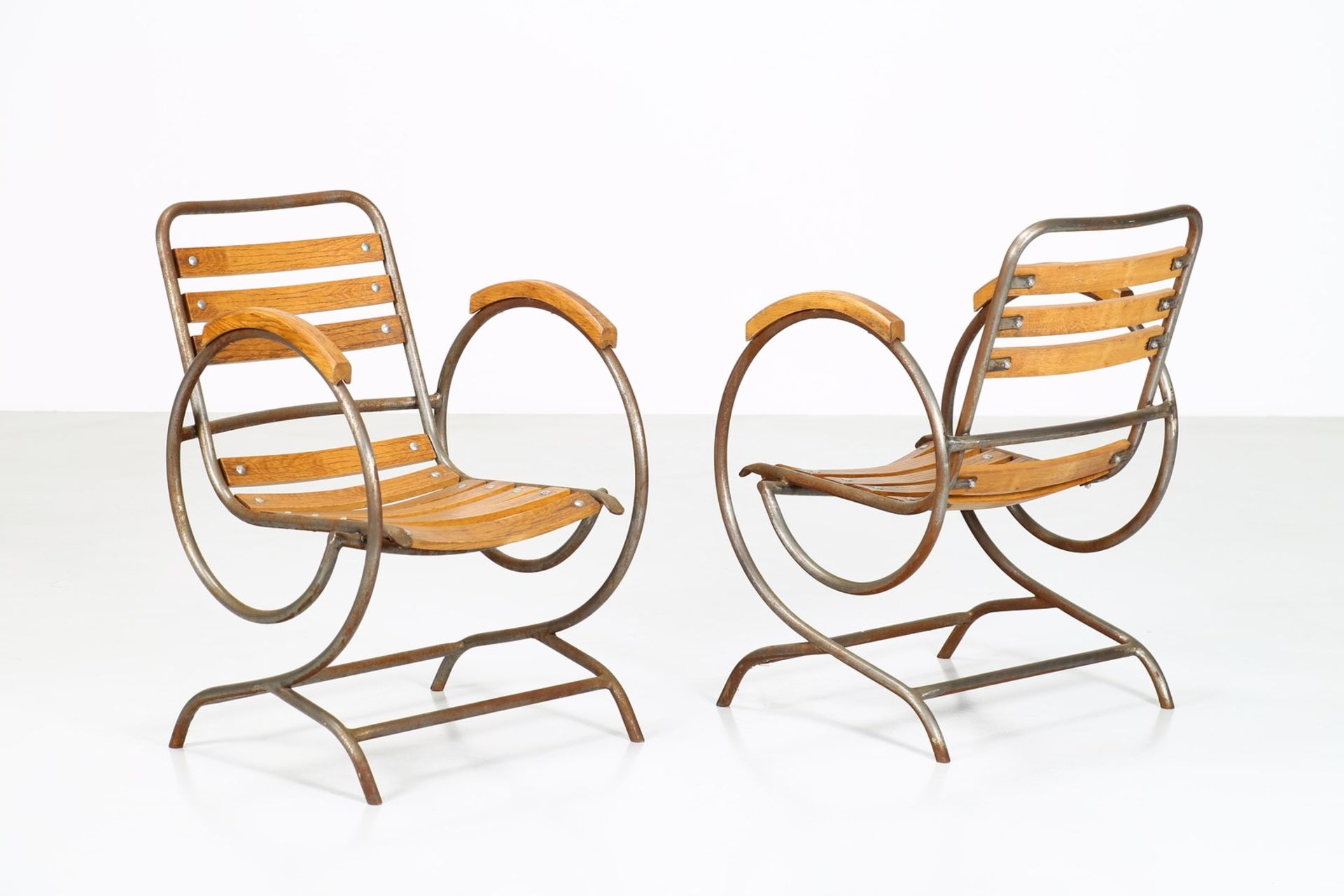 MANIFATTURA ITALIANA Pair of armchairs.