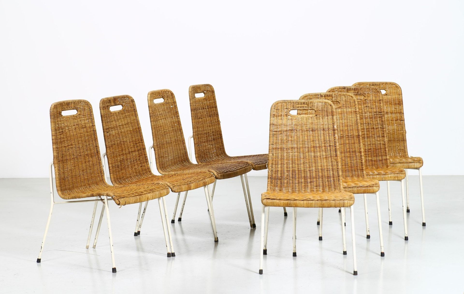 CARLO PAGANI Eight chairs.