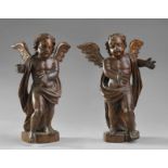 SCULTORE VENETO DEL XVIII SECOLO A pair of carved wooden angels.