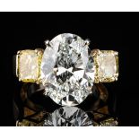 7.32 Oval Diamond, VS1/G & 2 FIY GIA 3-stone ring