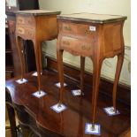 A pair of Louis XVI style kingwood bedside chests, the marble tops above two frieze drawers, on