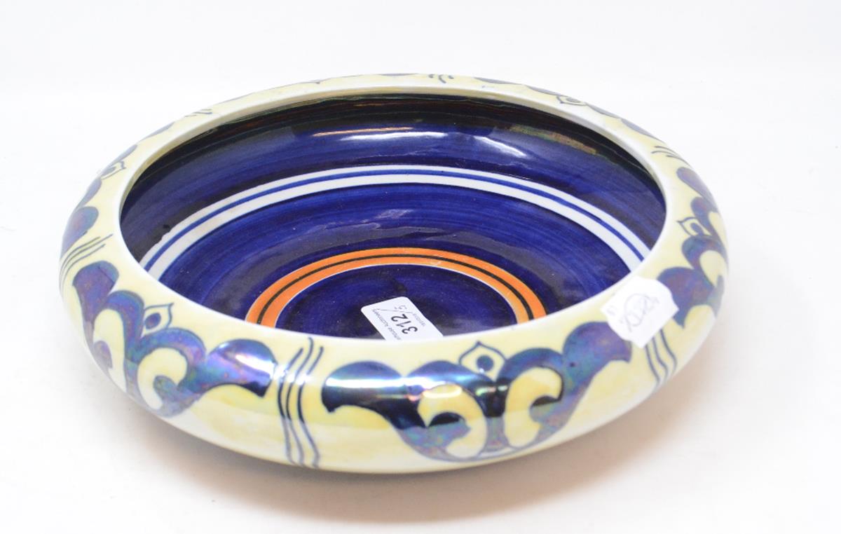 A Bursley Ware lustre bowl, cracked, 25.5 cm diameter, a Royal Doulton toothbrush holder,