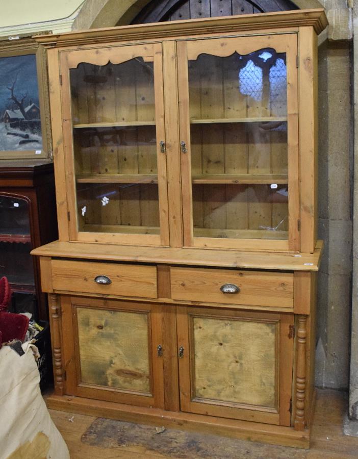 A pine kitchen dresser, with a pair of glazed doors above two frieze drawers and a pair of panel - Image 2 of 4
