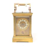 A carriage clock, with repeat, the 6.5 cm wide brass dial, signed Camerden & Forster, New York, with