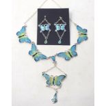 A silver and enamel butterfly necklace, and a pair of similar drop earrings (2) Modern