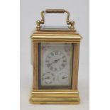 A carriage timepiece, in a brass case, 10 cm high Modern