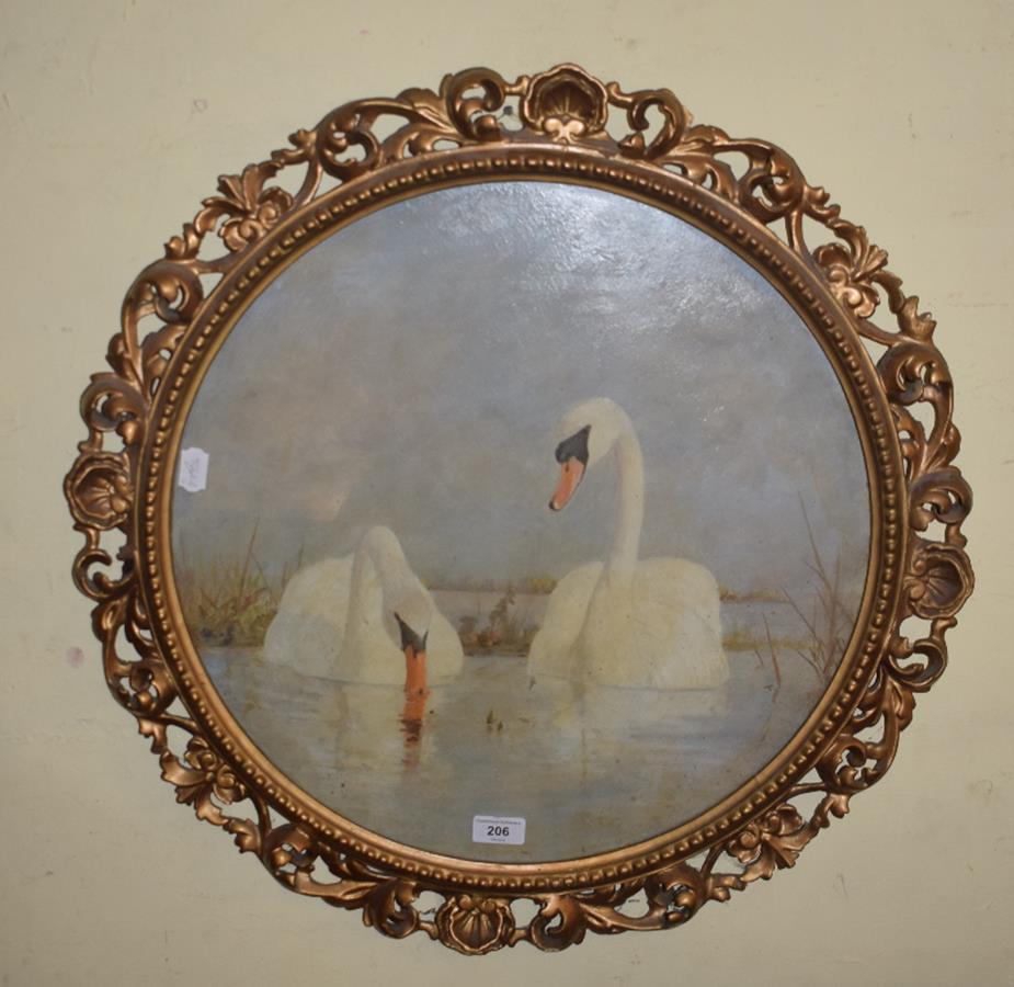 English school, a pair of swans, oil on board, 49 cm diameter, in a Florentine gilt frame