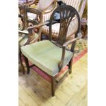 A 19th century mahogany carver chair, with a pierced splat, on downswept legs