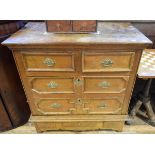 A 17th century oak chest, of five short and two long drawers, in two sections, 97 cm wide