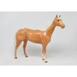 A Beswick Large Hunter, 2nd version, palomino, 1734, and three other palomino horses, 701, back legs