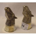 A pair novelty silver condiments, in the form of horses heads, 7.5 cm high Modern