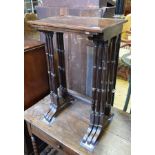 A nest of three 19th century rosewood tables, on ring turned supports, the largest 49.5 cm wide
