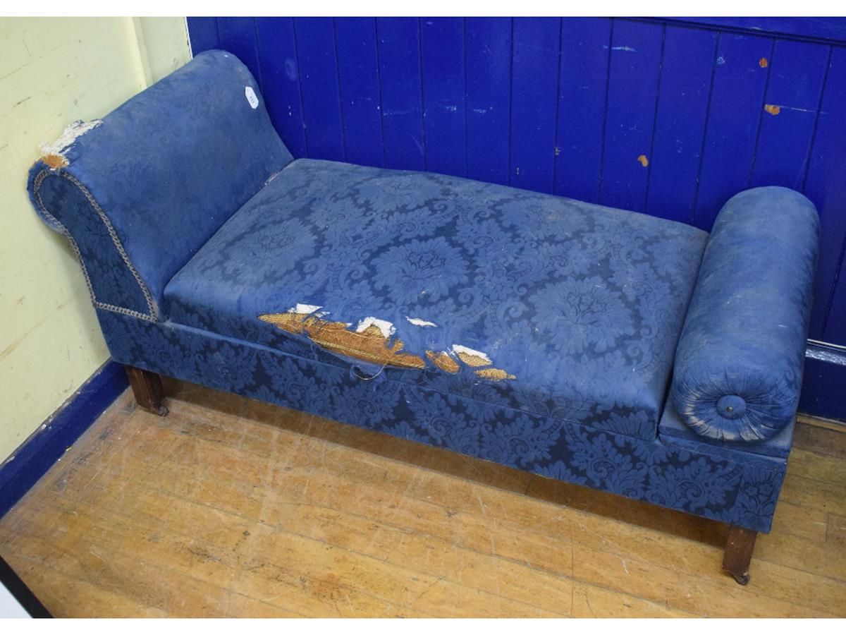 A daybed, with blue upholstery, on square legs, 145 cm wide