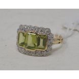 A 9ct gold, peridot and diamond cluster ring, approx. ring size O Report by NG This is a modern item