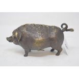 A novelty table bell, in the form of a pig, 9 cm high Modern