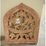 A Mughal sandstone panel, of lancet form, with floral decoration, 41 cm wide