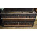 A pair of late 19th/early 20th century travelling trunks, with wooden battens, 115 cm wide (2)