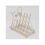 A novelty plated golf toast rack Modern