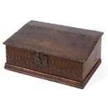 An 18th century carved oak bible box, 58 cm wide See illustration Report by RB Top split