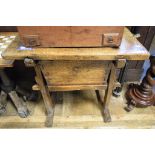 A 19th century Spanish provincial table, with a pull out basket drawer, 88 cm wide