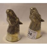 A pair novelty silver condiments, in the form of horses heads, 7.5 cm high Modern