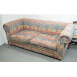 A three seater sofa, and a matching ottoman (2)