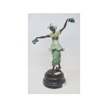 An Art Deco style painted bronze figure of a dancing lady, on a marble base, 38.5 cm high Modern