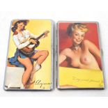 A cigarette case, decorated a pin-up girl, and another similar (2) Modern