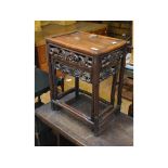 A nest of two Chinese hardwood tables, the largest 39.5 cm wide