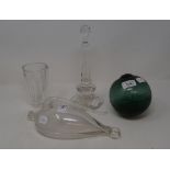 A Dutch weather glass, 26.5 cm high, a glass wig stand, 25.5 cm high, a green glass fishing float,