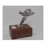 A Rolls Royce Spirit of Ecstasy car mascot, mounted on a plinth, 14 cm high