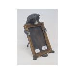 A painted bronze photograph frame, in the form of a cat, 25 cm high Report by GH No damage or